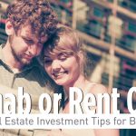 Young couple reading real estate investment pamphlet