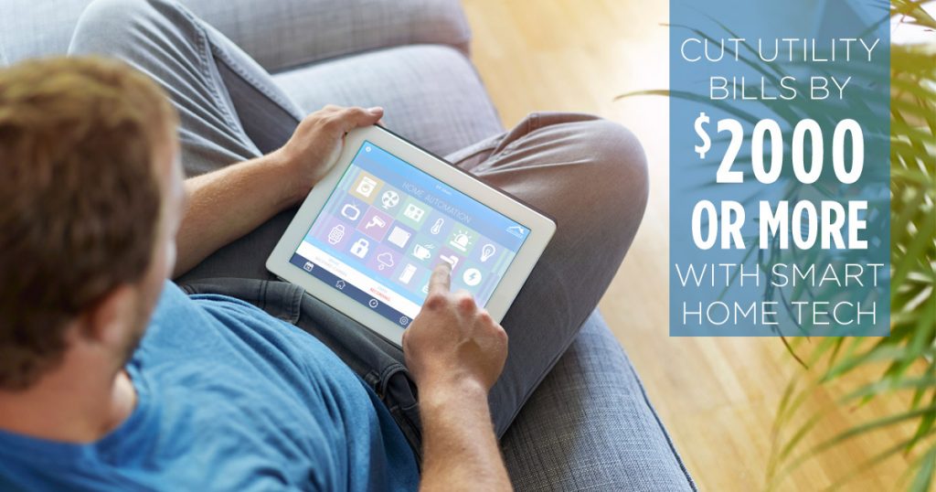 man sitting on couch using a home automation app on his tablet